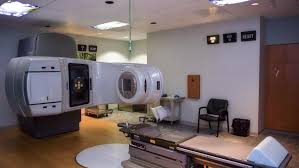 Dedicated radioisotope therapy unit room with nuclear medicine treatment equipment