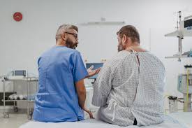 Doctor consulting with a patient during a pre-surgical medical evaluation